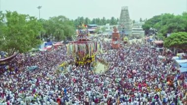 An aerial view of the chariot procession and celebration of a Hindu religious festival at Yediyur, Karnataka