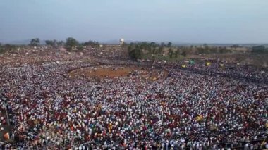 Aerial top view of a huge crowd of people gathered at the annual Hindu religious festival karnikotsava(prophecy),mailaralingeshwara karnika