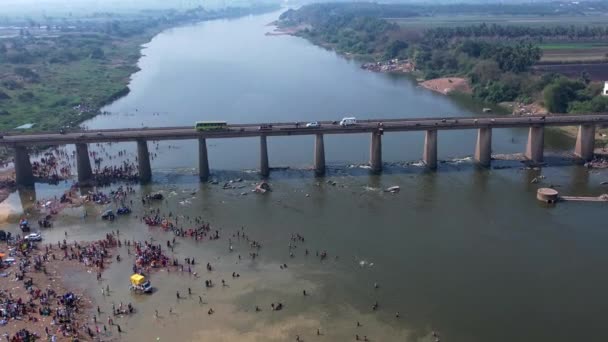 Aerial View People Bathing Large River Long Bridge Hindu Religious — Video Stock