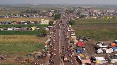 Aerial view of huge crowd moving on busy roads during Hindu religious annual festival.karnikotsava(prophecy),mailaralingeshwara karnika