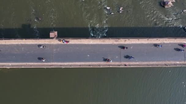 Aerial Tracking View Bikes Vehicles Crossing Long River Bridge Sunny — Vídeos de Stock