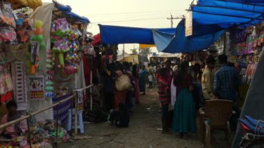 Vijayanagara,India-February 7,2023:A view of stalls or shops with people shopping during the Hindu religious annual festival