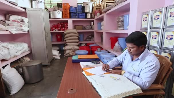 Bangalore India April 2016 View Employee Writing Ledgers Grocery Storeroom — Stock Video