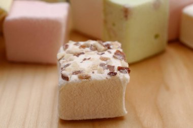 marshmallow close-up on wooden background