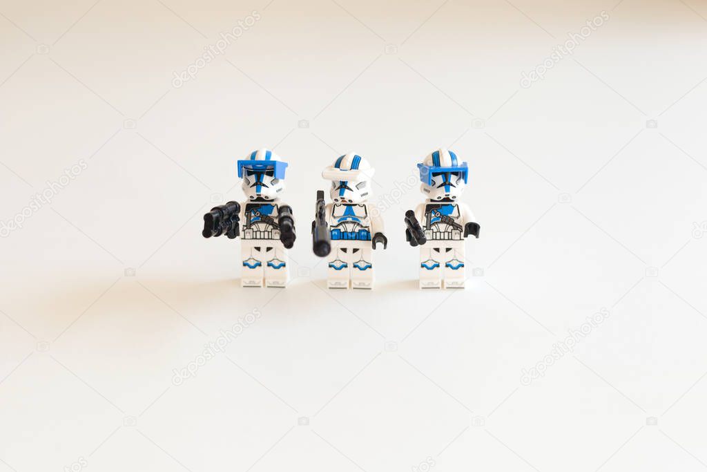 Tallinn, ESTONIA-AUGUST 7 2023- Lego star wars troopers on white background. close up of three mini figures