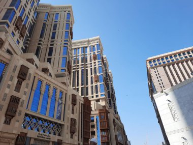 Mescid-i Haram, Mekke, Suudi Arabistan 'ın önündeki Jabal Omar' ın yüksek binalarının güzel manzarası..