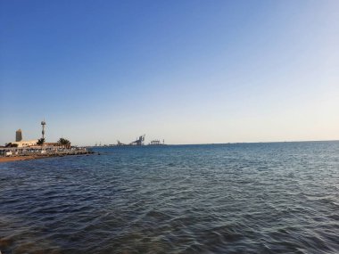 Beautiful evening and colorful sunset at Jeddah, Corniche, Saudi Arabia, The Jeddah Corniche, also known as the Jeddah Waterfront, is a coastal area of the city of Jeddah, Saudi Arabia. Located along the Red Sea.