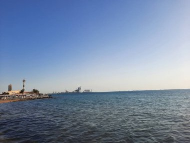 Beautiful evening and colorful sunset at Jeddah, Corniche, Saudi Arabia, The Jeddah Corniche, also known as the Jeddah Waterfront, is a coastal area of the city of Jeddah, Saudi Arabia. Located along the Red Sea.