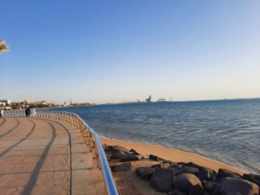 Beautiful evening and colorful sunset at Jeddah, Corniche, Saudi Arabia, The Jeddah Corniche, also known as the Jeddah Waterfront, is a coastal area of the city of Jeddah, Saudi Arabia. Located along the Red Sea.
