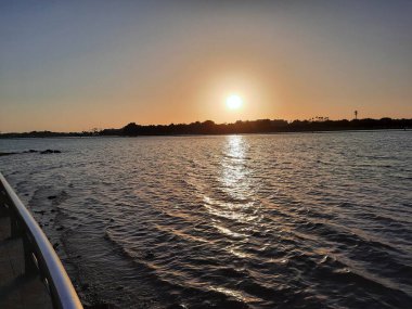 Beautiful evening and colorful sunset at Jeddah, Corniche, Saudi Arabia, The Jeddah Corniche, also known as the Jeddah Waterfront, is a coastal area of the city of Jeddah, Saudi Arabia. Located along the Red Sea.