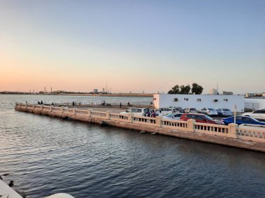 Beautiful evening and colorful sunset at Jeddah, Corniche, Saudi Arabia, The Jeddah Corniche, also known as the Jeddah Waterfront, is a coastal area of the city of Jeddah, Saudi Arabia. Located along the Red Sea.