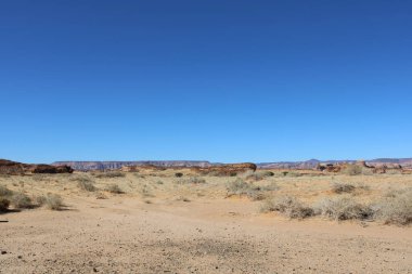 El-Ula, Suudi Arabistan 'daki Madain Saleh arkeolojik sahasının güzel gündüz manzarası.