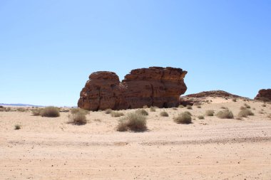 El-Ula, Suudi Arabistan 'daki Madain Saleh arkeolojik sahasının güzel gündüz manzarası.