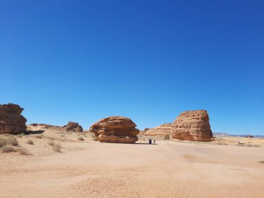 El-Ula, Suudi Arabistan 'daki Madain Saleh arkeolojik sahasının güzel gündüz manzarası.