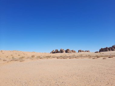 El-Ula, Suudi Arabistan 'daki Madain Saleh arkeolojik sahasının güzel gündüz manzarası.