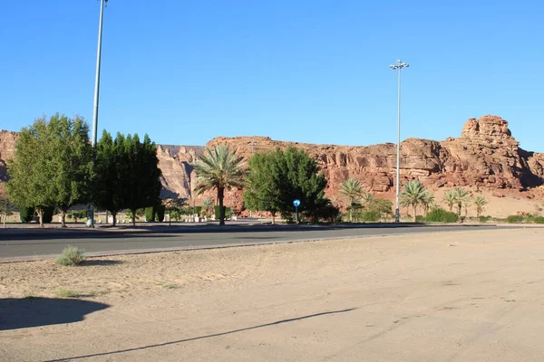 stock image A beautiful daytime view of a winter park in Al-Ula, Saudi Arabia. The park is surrounded by ancient hills.