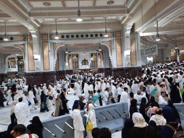 Pilgrims walk between the hills of Safa and Marwah during Umrah at the Masjid Al Haram in Mecca.