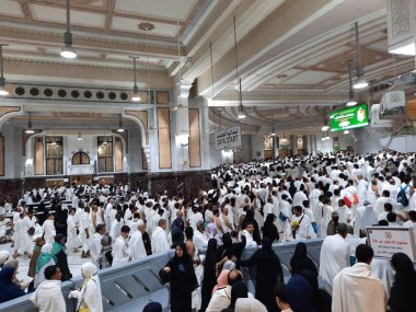 Pilgrims walk between the hills of Safa and Marwah during Umrah at the Masjid Al Haram in Mecca.