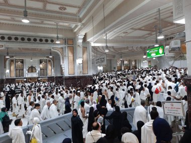 Pilgrims walk between the hills of Safa and Marwah during Umrah at the Masjid Al Haram in Mecca.