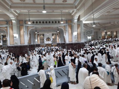 Pilgrims walk between the hills of Safa and Marwah during Umrah at the Masjid Al Haram in Mecca.