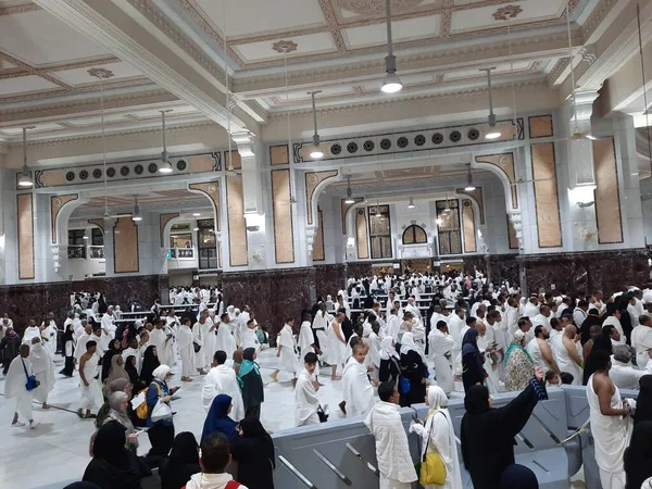 Pilgrims walk between the hills of Safa and Marwah during Umrah at the Masjid Al Haram in Mecca.