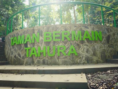 Bandung, Indonesia - August 3rd 2024; A large text sign located in one corner of the Forest Park Ir. H. Djuanda who is in the city of Bandung clipart