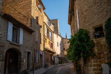 VIew on medieval buildings in sunny day, vacation destination, famous wine making village Chateauneuf-du-pape in Provence, France