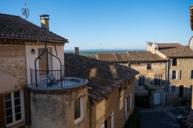 VIew on medieval buildings in sunny day, vacation destination, famous wine making village Chateauneuf-du-pape in Provence, France