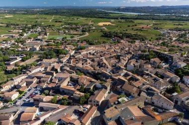 Aerial view on green vineyards and villages near Mont Brouilly, wine appellation Cote de Brouilly beaujolais wine making area along Beaujolais Wine Route,  France