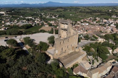 Aerial view on green vineyards and villages near Mont Brouilly, wine appellation Cote de Brouilly beaujolais wine making area along Beaujolais Wine Route,  France