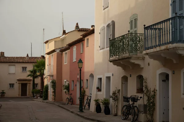 Colorful houses in Port Grimaud, village on Mediterranean sea with yacht harbour, Provence, summer vacation in France