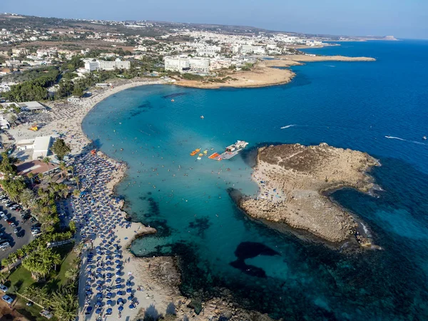 stock image Aerial panoramic view on holidays villas and resorts and blue crystal clear water on Mediterranean sea near Nissi beach, Ayia Napa, Cyprus. Sea holidays.