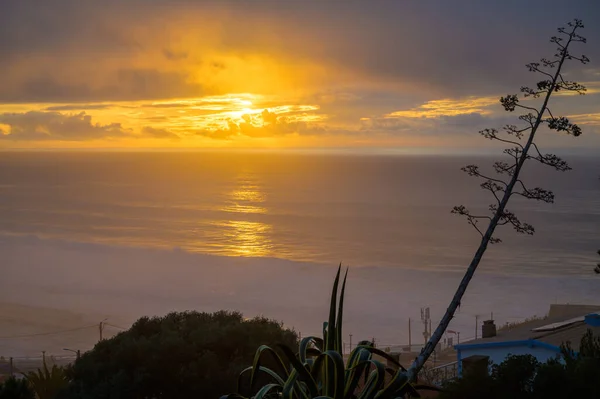 stock image Magoito Beach on Atlantic ocean at sunset, beautiful sandy beach on Sintra coast, Lisbon district, Portugal, part of Sintra-Cascais Natural Park with natural points of interest