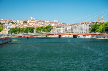 Tourists destination, views of Rhone river, streets, houses, cafes in old central part of Lyon in summer, France