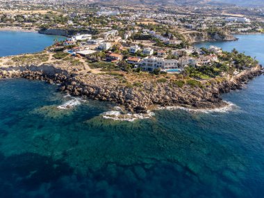 Aerial view on clear blue water of Coral bay in Peyia, Paphos, Mediterranean sea near Paphos, Cyprus, Coral beach