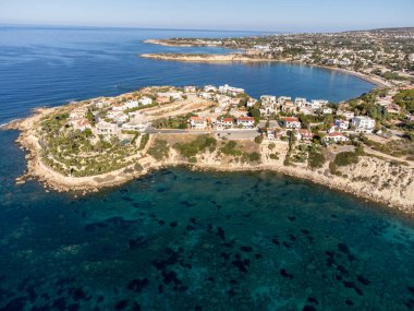 Aerial view on clear blue water of Coral bay in Peyia, Paphos, Mediterranean sea near Paphos, Cyprus, Coral beach