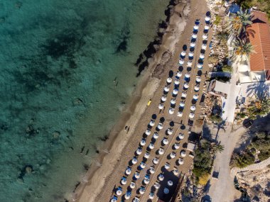 Aerial view on clear blue water of Coral bay in Peyia, Paphos, Mediterranean sea near Paphos, Cyprus, Coral beach