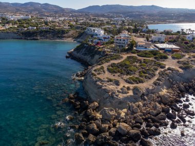 Aerial view on clear blue water of Coral bay in Peyia, Paphos, Mediterranean sea near Paphos, Cyprus, Coral beach