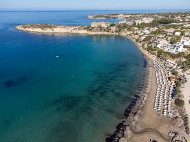 Aerial view on clear blue water of Coral bay in Peyia, Paphos, Mediterranean sea near Paphos, Cyprus, Coral beach