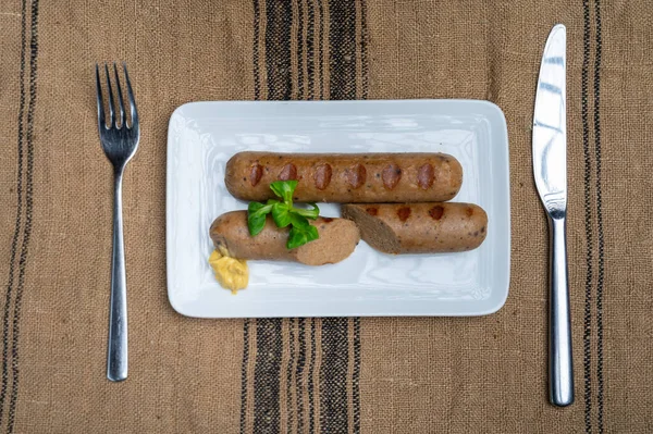 Tasty grilled vegan sausages made from vegetarian plant based soya beans imitation meat healthy food
