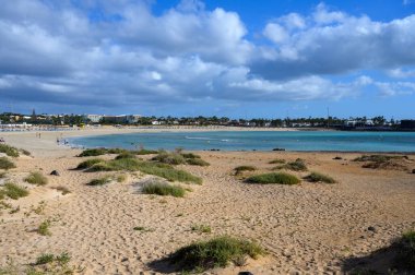 Winter sea and sun vacation in Caleta de Fuste touristic village on Fuerteventura, Canary islands, Spain