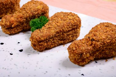 Tasty vegetarian vegan meat free chicken thighs, healthy food close up