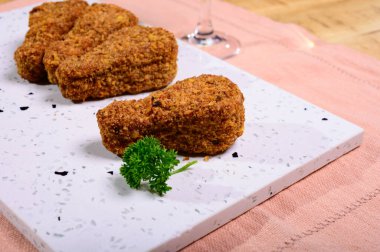 Tasty vegetarian vegan meat free chicken thighs, healthy food close up