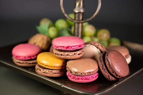 Macarons or French macaroon  sweet meringue-based confection made with egg white, icing sugar, granulated sugar, almond meal, and food colouring, sweet french dessert