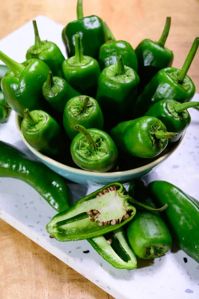 stock image Fresh green mild padron pepper pementos, ready for grill or to be fried with olive oil, traditional snack in Galicia, Spain.