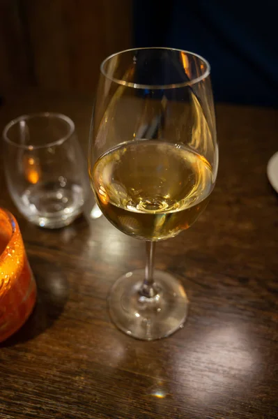 stock image wo glasses of Chilean Chardonnay Viognier white wine served in cosy Dutch restaurant close up