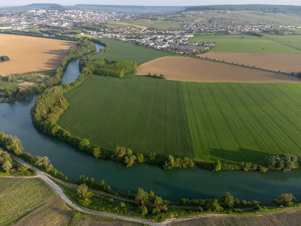 stock image Panoramic aerial view on green premier cru champagne vineyards and fields near village Hautvillers and Cumieres and Marne river valley, Champange, France