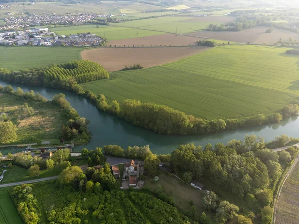 stock image Panoramic aerial view on green premier cru champagne vineyards and fields near village Hautvillers and Cumieres and Marne river valley, Champange, France