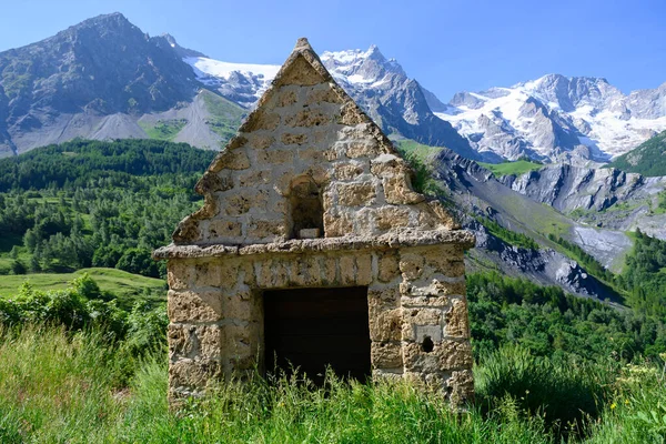 stock image La Grave, village in Hautes-Alpes department in southeastern France, small ski resort with off-piste for extreme skiers in French Alps, dominated by mountain peak La Meije