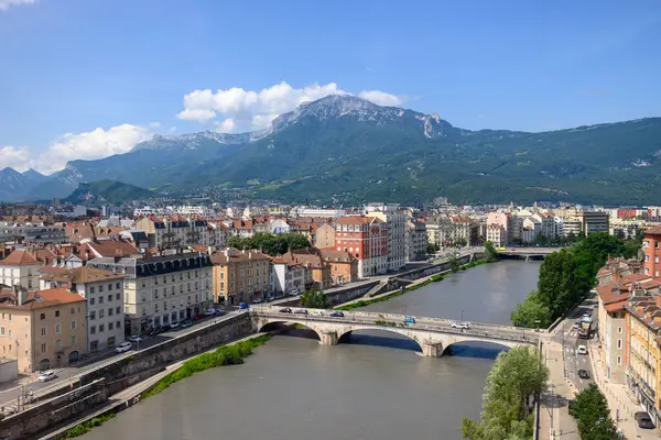 stock image View on central part of Grenoble city from Bastille fortres witn mountains around, old cable car, Isere, France in summer